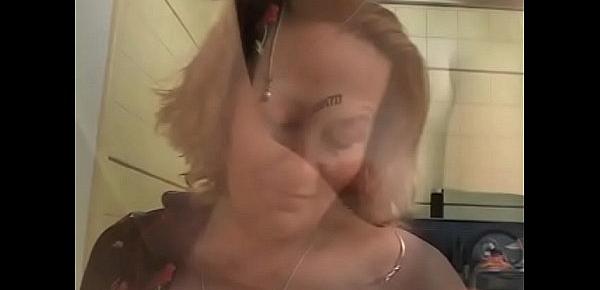  Older lady shoves strap-on into young blonde&039;s mouth